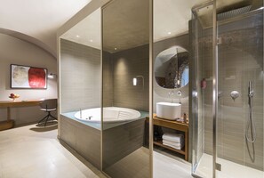 Jetted bath, rainfall showerhead, free toiletries, hair dryer