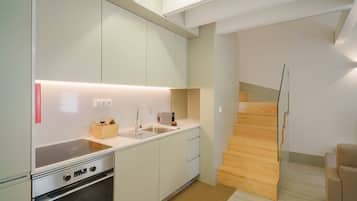 Departamento Premium | Cocina privada | Refrigerador, horno, parrilla de estufa y lavavajillas