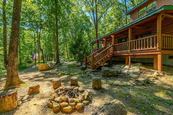 Front yard with view of fire pit and grill
