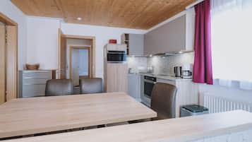 Luxury Apartment | Private kitchen | Fridge, microwave, oven, stovetop