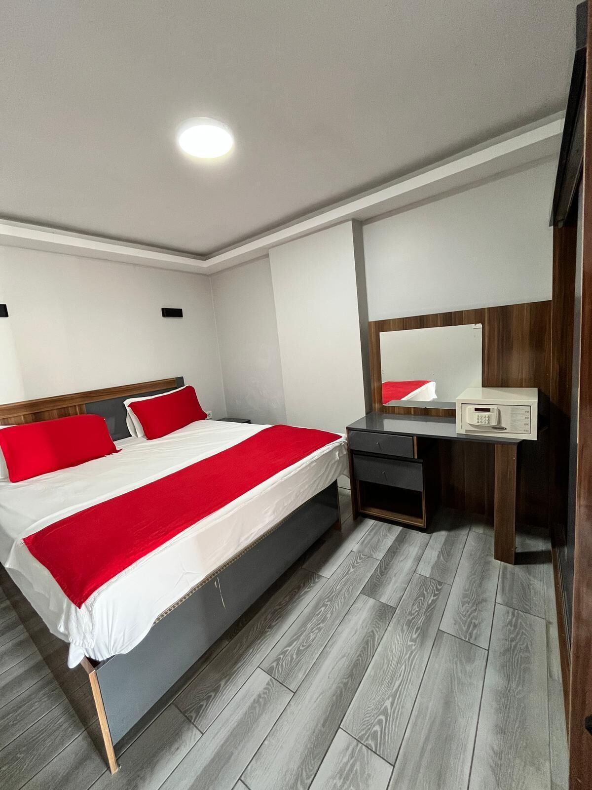 Standard Room, Partial Sea View | Egyptian cotton sheets, premium bedding, down comforters, minibar