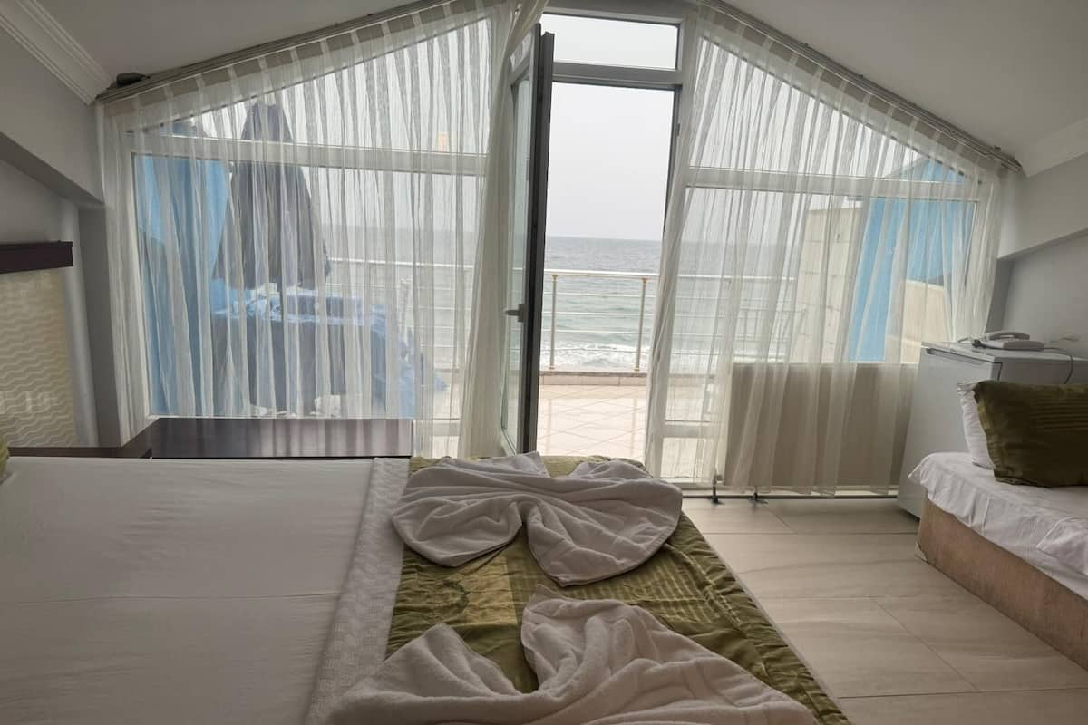 Deluxe Room, 1 Bedroom, Sea View | Beach/ocean view