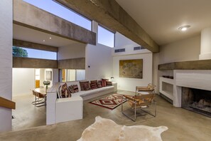 Smart TV, fireplace, books, music library