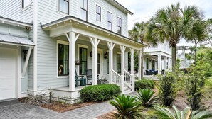 A two-story house with a covered porch, a front door, and a mailbox. - Renovated Seagrove Home with LSV & Pool Access (Santa Rosa Beach)