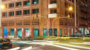 A multi-story hotel with a modern architectural design, featuring a prominent corner entrance and a series of balconies. - Zeus Essence Athens Central, Trademark Collection by Wyndham (Athens)