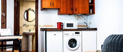 Fridge, microwave, coffee/tea maker, electric kettle