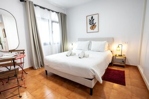 1 habitación, tabla de planchar con plancha, wifi gratis y ropa de cama 