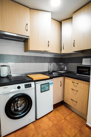 Fridge, microwave, coffee/tea maker, electric kettle