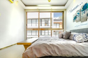 2 slaapkamers, een strijkplank/strijkijzer, gratis wifi, beddengoed