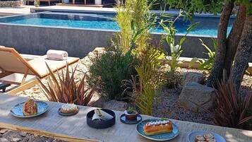 Seasonal outdoor pool, pool umbrellas, sun loungers