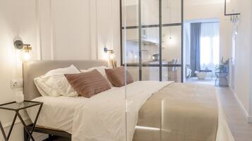 Deluxe suite (2) | 1 slaapkamer, verduisterende gordijnen, een strijkplank/strijkijzer