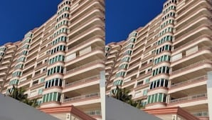 A multi-story hotel with balconies and a clear blue sky. - Departamentos CB1 (Mazatlán)
