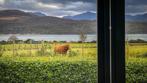 Stylishly renovated Croft house with uninterrupted views of fields, hills & sea