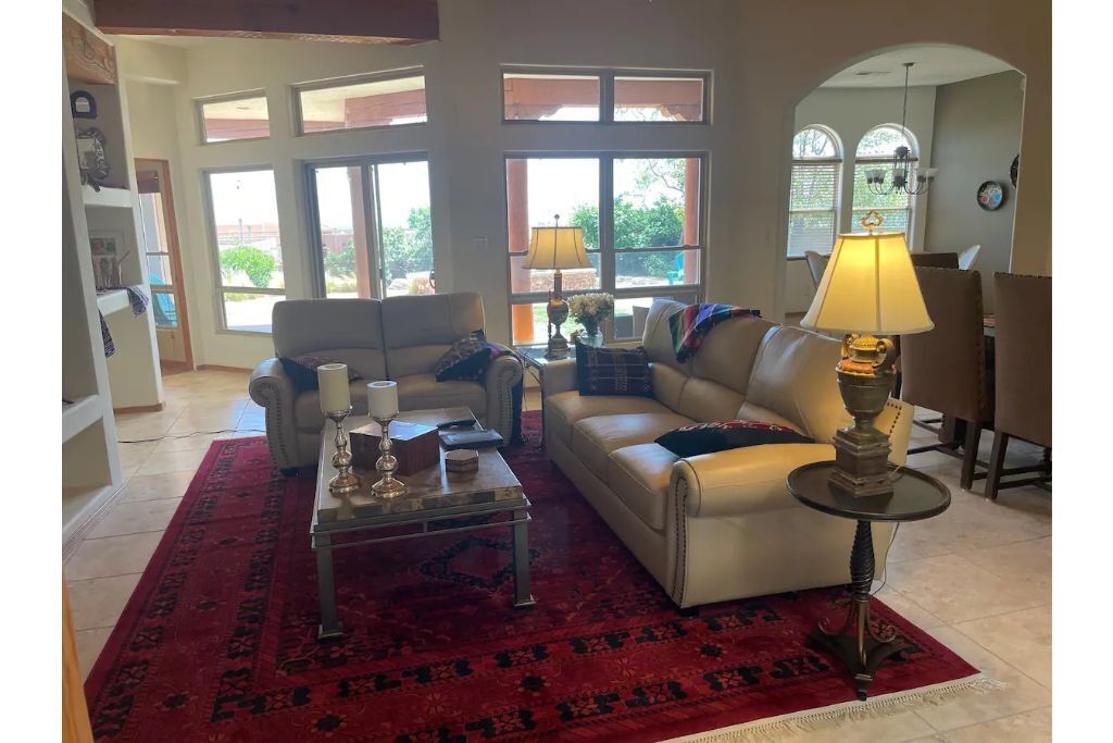 Smart TV, fireplace, books, printers