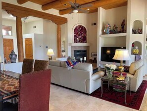 Smart TV, fireplace, books, printers