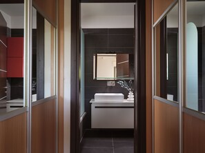 Bathtub, eco-friendly toiletries, hair dryer, towels