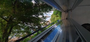 Chambre Double, 1 lit double, vue partielle sur l'océan | Vue sur la plage/l’océan