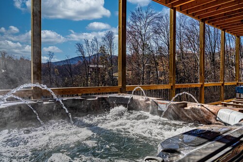 Indoor pool, hot tub, game room, all en suite bedrooms, and mountain views.