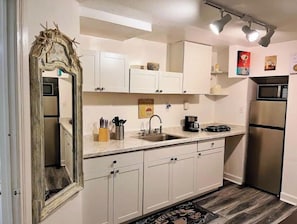 Fridge, microwave, stovetop, electric kettle