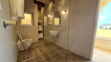 Villa | Bathroom | Shower, deep soaking tub, hair dryer, towels