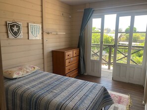 Casa premium, acesso à piscina, vista para a praia | 2 quartos, roupas de cama premium, individualmente decorados