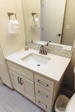 Hair dryer, towels, soap, shampoo