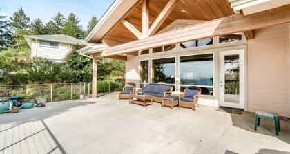 Dog-friendly ocean-view home near the beach with large deck, grill, & Ping-Pong