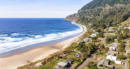Dog-friendly ocean-view home near the beach with large deck, grill, & Ping-Pong