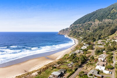 Dog-friendly ocean-view home near the beach with large deck, grill, & Ping-Pong