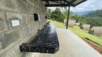 Rainfall showerhead, towels, soap, shampoo