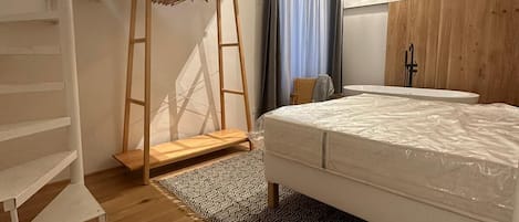 2 dormitorios, tabla de planchar con plancha, wifi gratis y ropa de cama