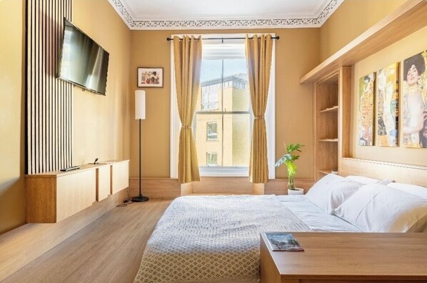 2 habitaciones, tabla de planchar con plancha, wifi y ropa de cama