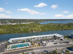 Wide view of waterways & surrounding greenery under bright coastal skies. - Belleview Gulf Condo #359 (Indian Shores)