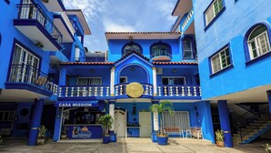 A blue building with a sign reading "Casa Mission". - OYO Casa Mission (Puerto Vallarta)