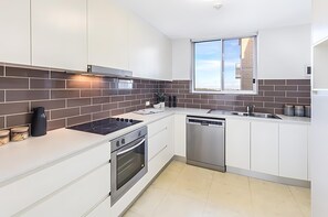 Microwave, stovetop, dishwasher - Cremorne- CRE31 Hampden Avenue - Spacious 1BR with Harbour Views Balcony Near Cremorne Neutral Bay (Cremorne)