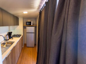 Fridge, microwave, stovetop, cookware/dishes/utensils