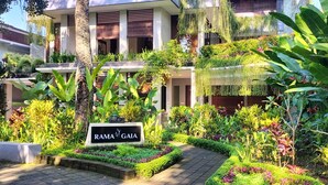 A modern building with a sign reading "RAMA GAIA". - Rama Gaia Villa (Ubud)