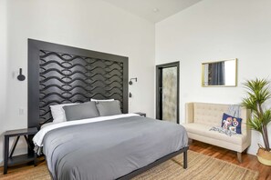 1 bedroom, desk, iron/ironing board, travel crib