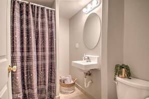 Shower, towels, soap, toilet paper