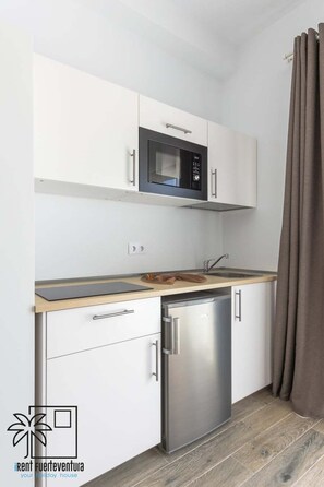 Fridge, microwave, toaster, cookware/dishes/utensils