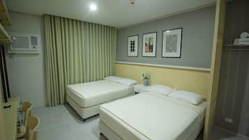 Deluxe Room | Desk, laptop workspace, blackout curtains, free WiFi