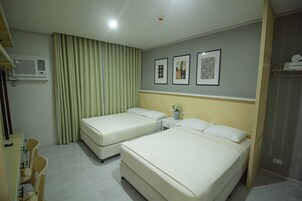 Deluxe Room | Desk, laptop workspace, blackout drapes, free WiFi