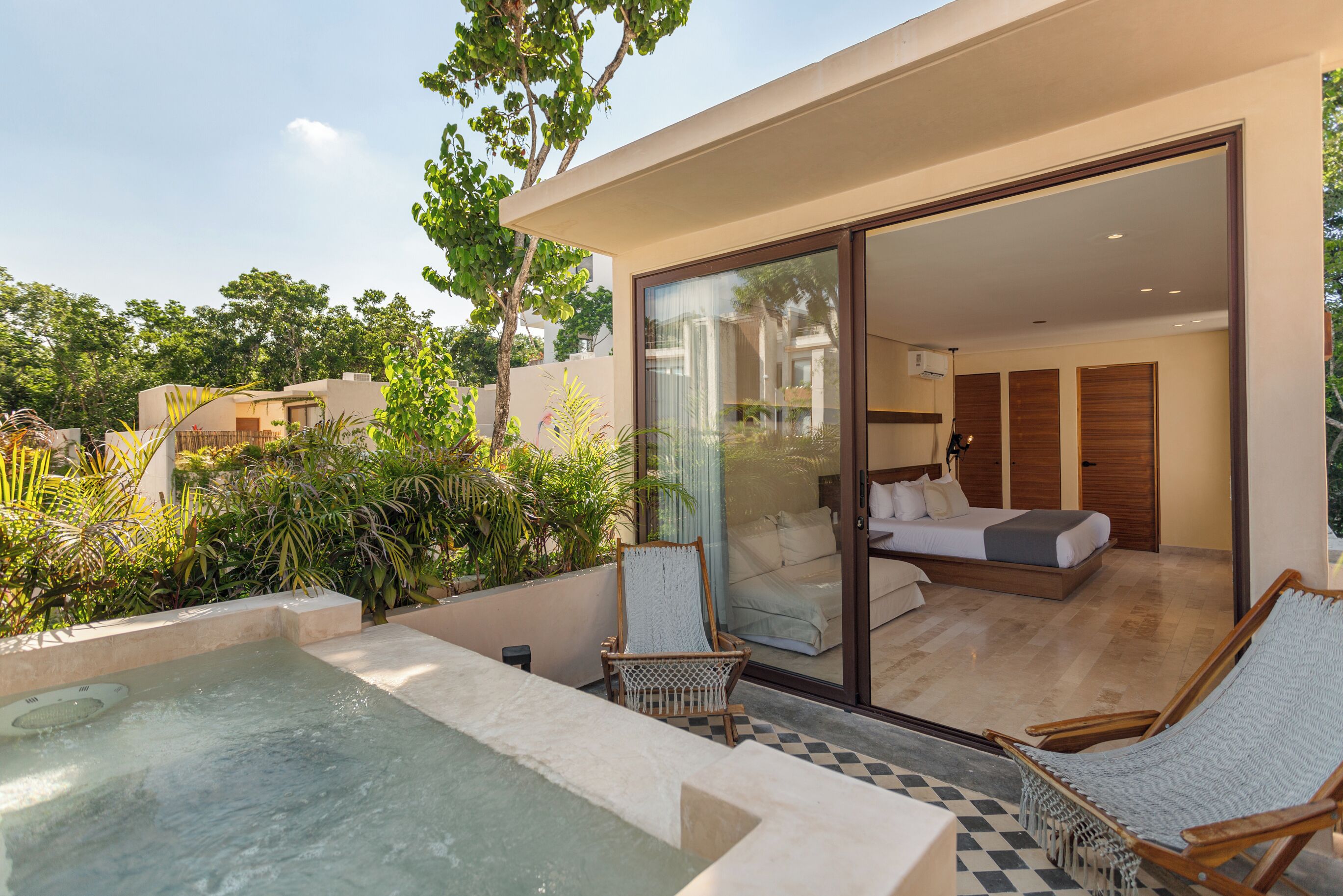 Deluxe King With Patio And Mini Pool | Living area | 32-inch Smart TV with satellite channels, TV, first-run movies