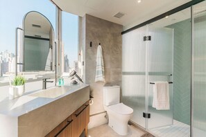 Luxury Double Room | Bathroom | Shower, rainfall showerhead, hair dryer, towels