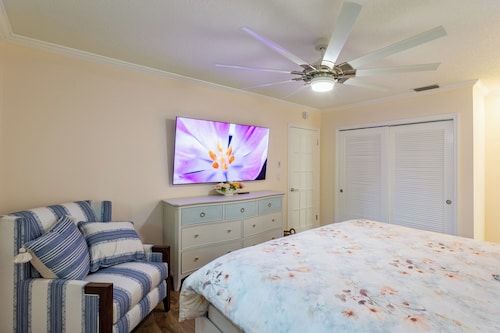 Coastal retreat with heated saltwater pool & spa in prime Delray Beach.