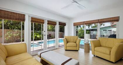Coastal retreat with heated saltwater pool & spa in prime Delray Beach.