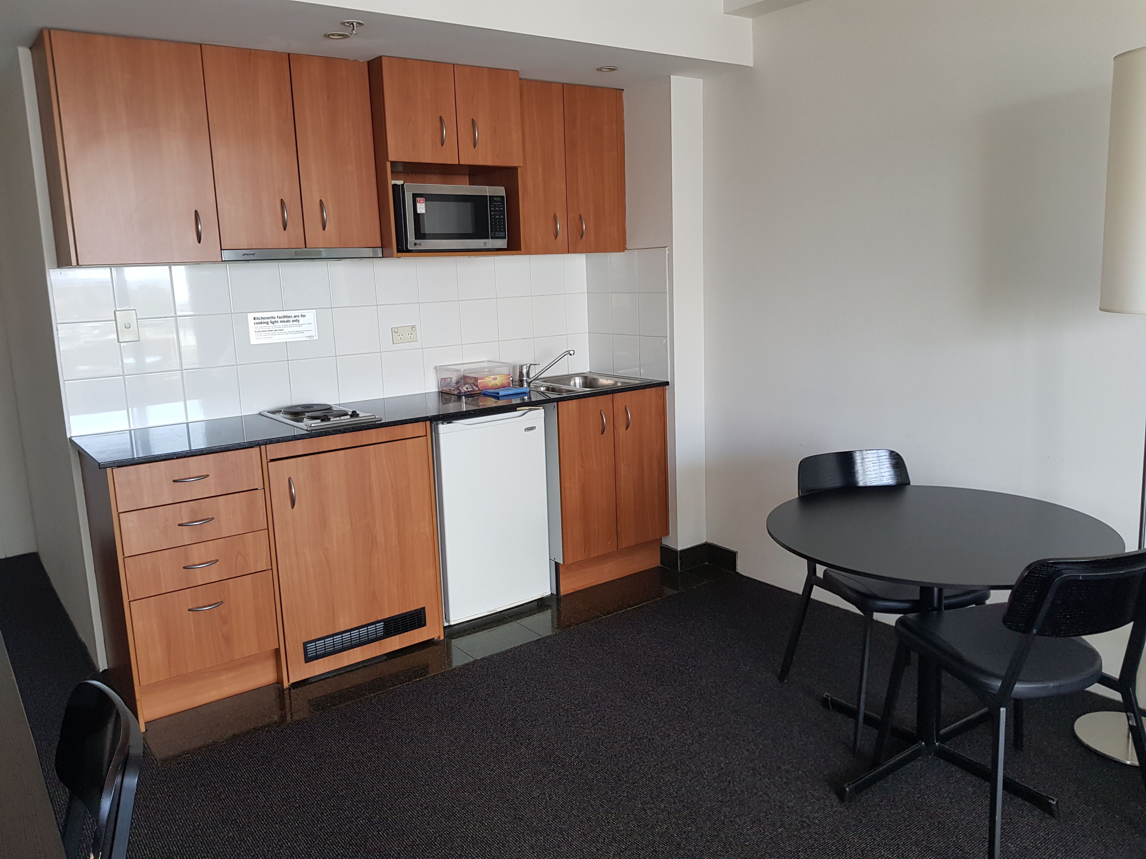 Apartment | Private kitchen | Mini-fridge, dining tables
