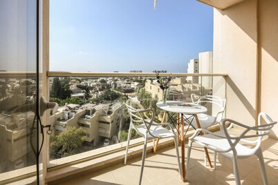 Skyline 1BR Apartment with City and Sea View