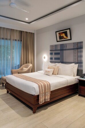 Desk, laptop workspace, bed sheets