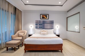 Desk, laptop workspace, bed sheets